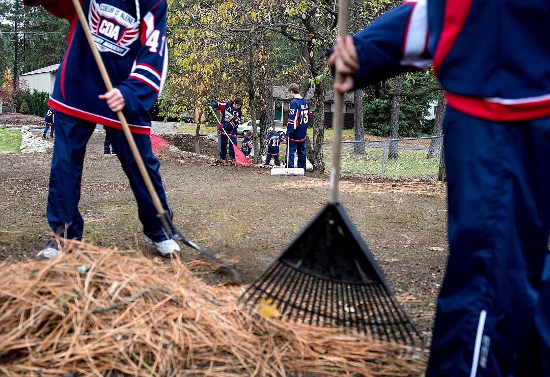 &lt;p&gt;Boys from the Coeur d'Alene Hockey Academy rake up pine needles to clean up the backyard of a Coeur d'Alene home as part of a &quot;Rake-A-Thon&quot; to raise money for the Coeur d'Alene Youth Education and Athletic Foundation, Inc. on Saturday.&lt;/p&gt;