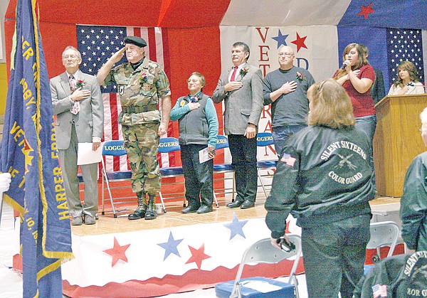 &lt;p&gt;At Libby High School, dignitaries, above, took part in a
Veterans Day program on Thursday. Guest speakers included, from
left, Tony Smith, Larry Pitcher, Mitzi Smart and U.S. Rep. Denny
Rehberg.&lt;/p&gt;
&lt;p&gt;&#160;&lt;/p&gt;