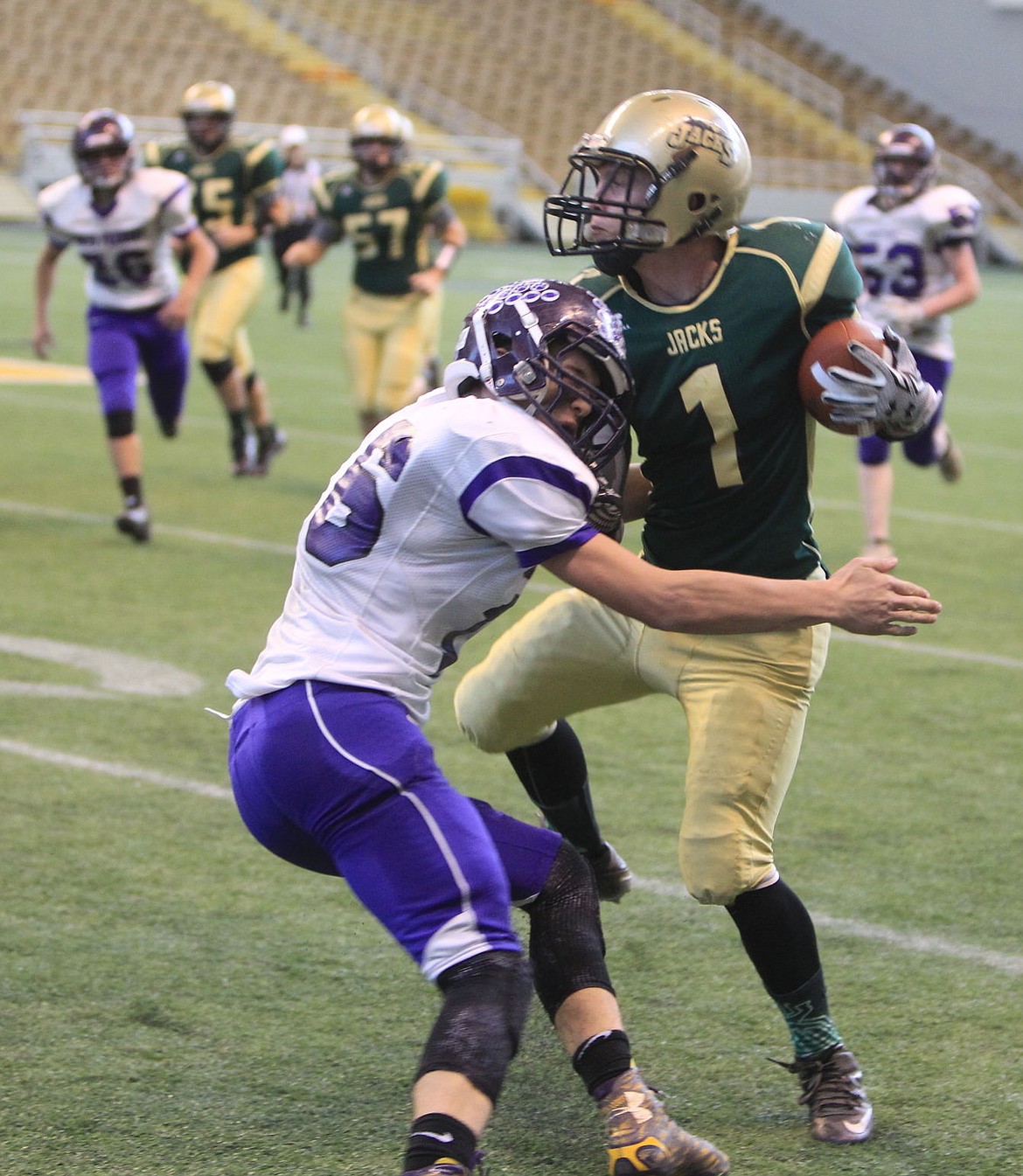 &lt;p&gt;JASON ELLIOTT/Press&lt;/p&gt;&lt;p&gt;St. Maries running back Kaleb Brown fights through the tackle of a North Fremont defender on Nov. 11 in a state 2A football quarterfinal game.&lt;/p&gt;