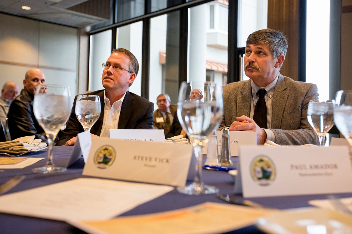 &lt;p&gt;Kootenai County Treasurer Steve Matheson, left, and Commissioner Marc Eberlein, right, and others listen to Kootenai County Sheriff Ben Wolfinger speak at a county commissioners and state legislators meeting Wednesday at Beverly's restaurant in Coeur d'Alene.&lt;/p&gt;