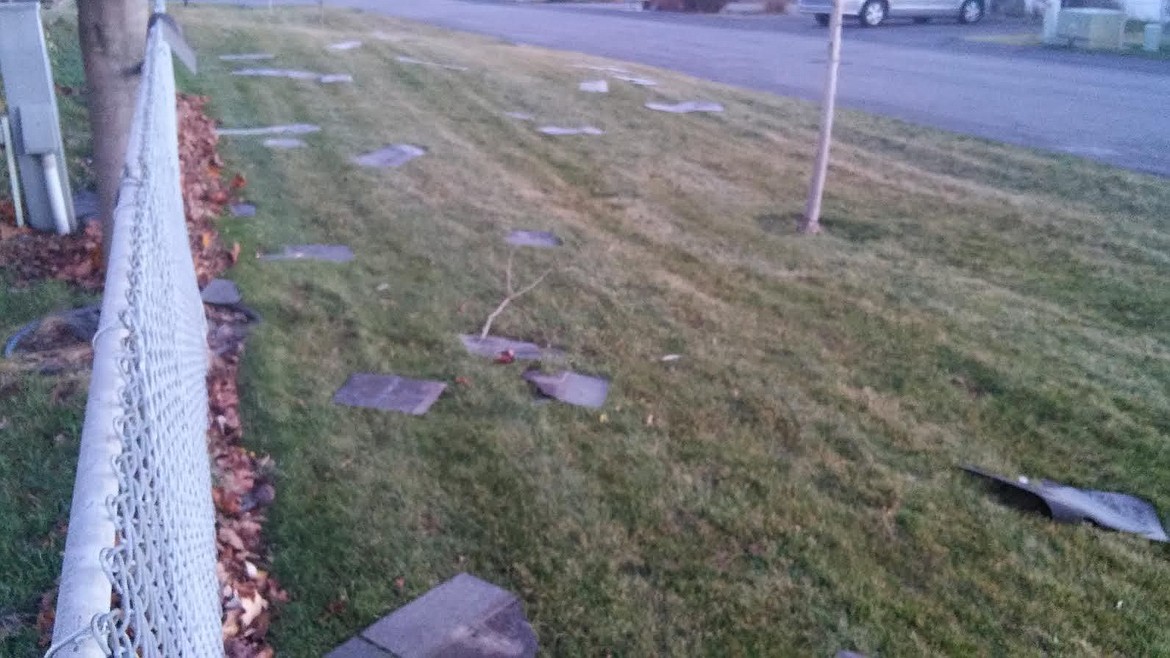 &lt;p&gt;Press reader Mike Reno sent in this image of roofing materials scattered near the road after the storm pulled it off the roof of a home in Camelot Estates in Post Falls.&lt;/p&gt;