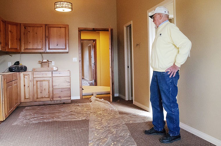 &lt;p&gt;Consultant Mike Felt looks over one of the rooms Wednesday afternoon at The Rising Mountains Assisted Living Center. Construction on the facility north of Bigfork is nearing completion and Felt hopes to be finished by the end of the year. Nov. 13, 2013 in Bigfork, Montana. (Patrick Cote/Daily Inter Lake)&lt;/p&gt;