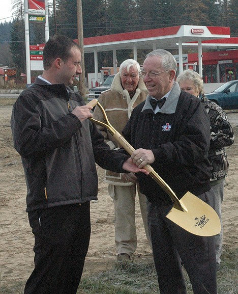 &lt;p&gt;From left, Super 1 Foods Director Ryan Wilson hands Ron McIntire, senior owner of Super 1 Foods, the golden shovel to break ground for the new Bonners Ferry Super 1 Foods.&lt;/p&gt;