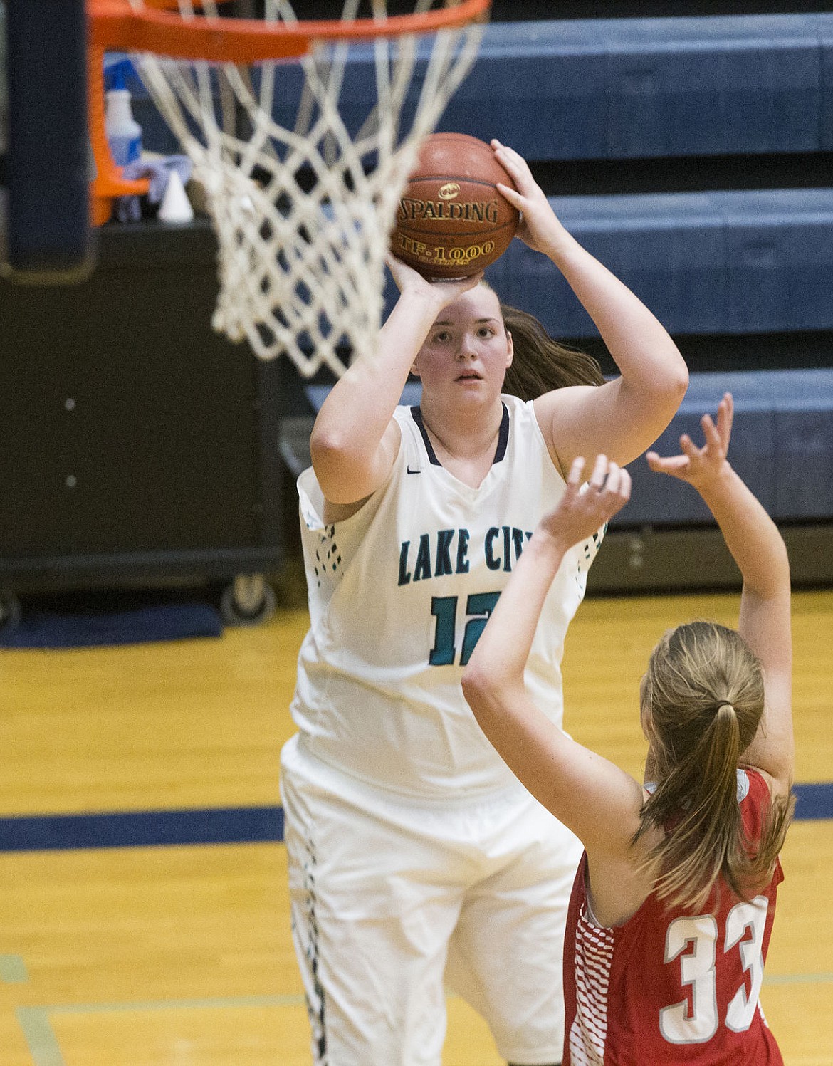 &lt;p&gt;LOREN BENOIT/Press Lake City's Lauren Rewers shoots for the basket during Thursday night's game against Sandpoint High School at Lake City. Rewers had 17 points in Lake City's 57-28 win.&lt;/p&gt;