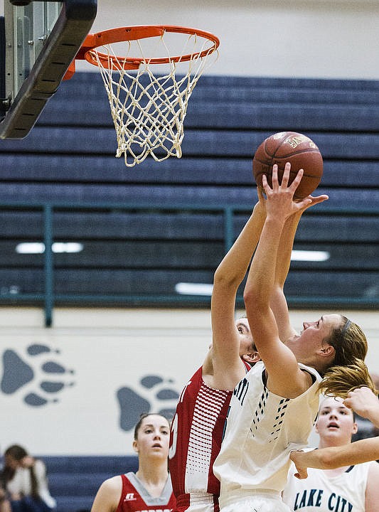 &lt;p&gt;LOREN BENOIT/Press Lake City High School beat the Sandpoint Bulldogs 57-28 behind Bridget Rieken's 13 points,18 rebounds, and Lauren Rewers' 17 points in the Timberwolves' season home opener.&lt;/p&gt;