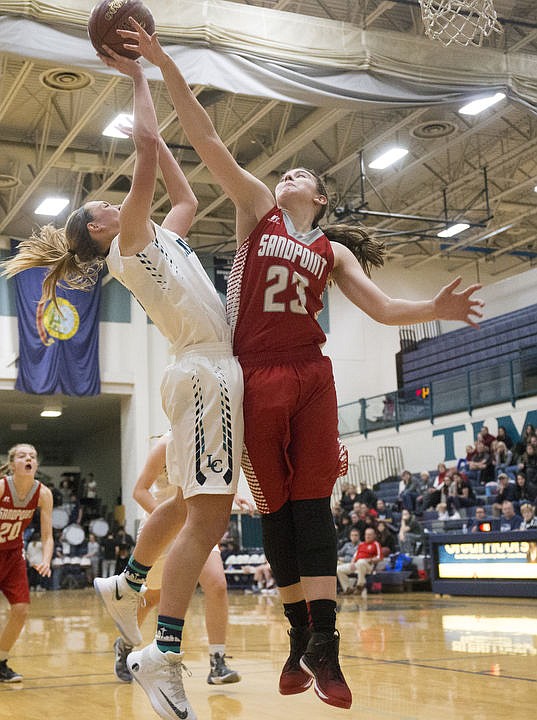 &lt;p&gt;LOREN BENOIT/Press Lake City High School beat the Sandpoint Bulldogs 57-28 behind Bridget Rieken's 13 points,18 rebounds, and Lauren Rewers' 17 points in the Timberwolves' season home opener.&lt;/p&gt;