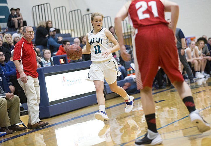 &lt;p&gt;LOREN BENOIT/Press Lake City High School beat the Sandpoint Bulldogs 57-28 behind Bridget Rieken's 13 points,18 rebounds, and Lauren Rewers' 17 points in the Timberwolves' season home opener.&lt;/p&gt;