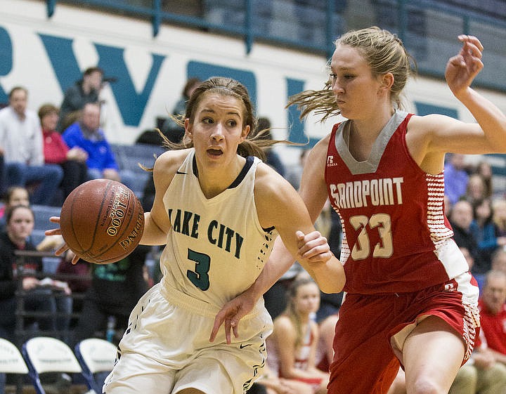 &lt;p&gt;LOREN BENOIT/Press Lake City High School beat the Sandpoint Bulldogs 57-28 behind Bridget Rieken's 13 points,18 rebounds, and Lauren Rewers' 17 points in the Timberwolves' season home opener.&lt;/p&gt;