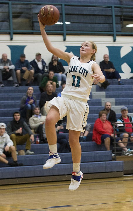 &lt;p&gt;LOREN BENOIT/Press Lake City High School beat the Sandpoint Bulldogs 57-28 behind Bridget Rieken's 13 points,18 rebounds, and Lauren Rewers' 17 points in the Timberwolves' season home opener.&lt;/p&gt;