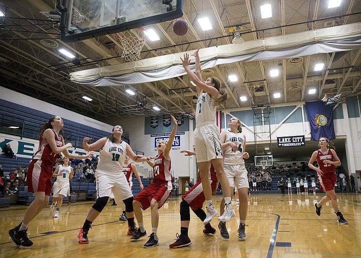 &lt;p&gt;LOREN BENOIT/Press Lake City High School beat the Sandpoint Bulldogs 57-28 behind Bridget Rieken's 13 points,18 rebounds, and Lauren Rewers' 17 points in the Timberwolves' season home opener.&lt;/p&gt;