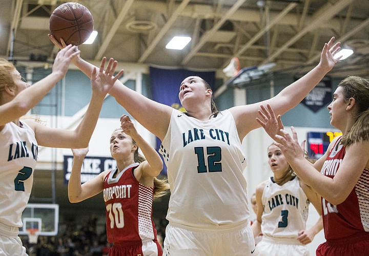 &lt;p&gt;LOREN BENOIT/Press Lake City High School beat the Sandpoint Bulldogs 57-28 behind Bridget Rieken's 13 points,18 rebounds, and Lauren Rewers' 17 points in the Timberwolves' season home opener.&lt;/p&gt;