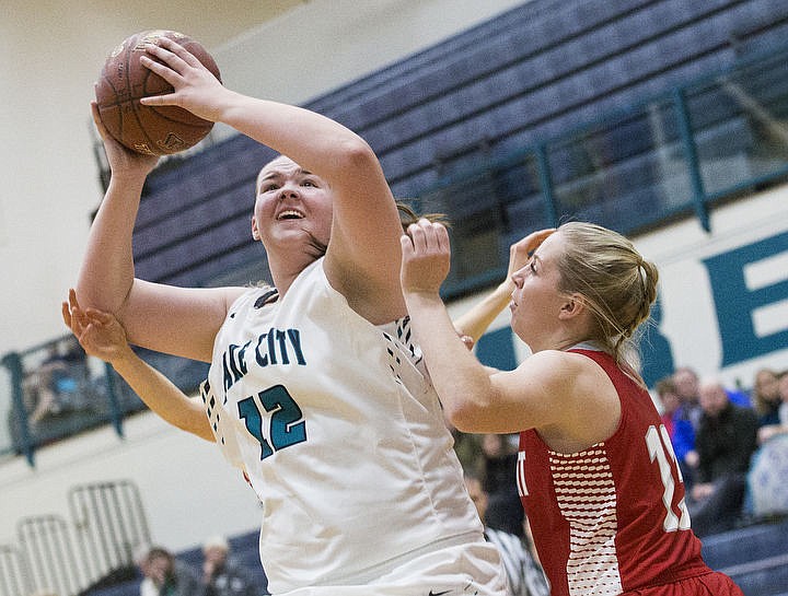 &lt;p&gt;LOREN BENOIT/Press Lake City High School beat the Sandpoint Bulldogs 57-28 behind Bridget Rieken's 13 points,18 rebounds, and Lauren Rewers' 17 points in the Timberwolves' season home opener.&lt;/p&gt;