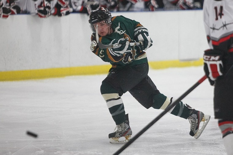 &lt;p&gt;Tucker Spooner puts a shot on goal Friday night during the Glacier Nationals' win over Tri-Cities at the Stumptown Ice Den in Whitefish.&lt;/p&gt;