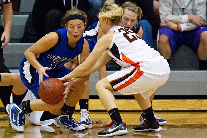 &lt;p&gt;The Vikings' Keyli Parker fights Kat Clancy, of Post Falls, over a loose ball in the second quarter.&lt;/p&gt;