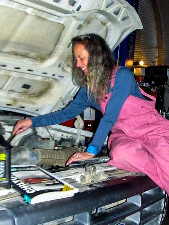 At 5-2 and 98 pounds, Cherie Kielian is so small she can work on some vehicles from inside the engine compartment. Her tiny hands allow her to carry out tasks her mechanic partner and husband Al can't.