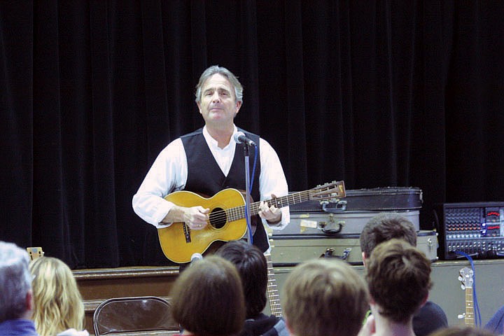 Blues guitarist Spencer Bohren gave a special two day performance last week. Here, he teaches students about how a simple song that a slave man created moves from person to person and the path it takes through the course of American music.