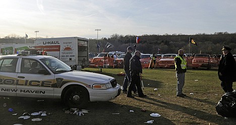 &lt;p&gt;Authorities work the scene where the driver of a rental truck carrying beer kegs through a parking area before an NCAA college football game between Yale and Harvard suddenly accelerated, fatally striking a 30-year-old woman and injuring two other women, in New Haven, Conn.&lt;/p&gt;