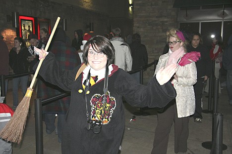 &lt;p&gt;Dressed as Harry Potter, an enthusiastic Rachel McEachran walks toward the Riverstone Cinema doors before the premiere of &quot;Harry Potter and the Deathly Hallows, Part 1,&quot; which opened on Friday at 12:01 am. The movie drew hundreds of viewers.&lt;/p&gt;