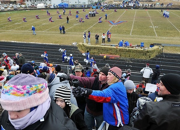 The grandstand fills up with minutes to go before the start of the game.