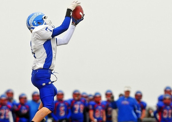 Fairfield's Colby Trent (7) intercepts the ball on the first drive of the game.