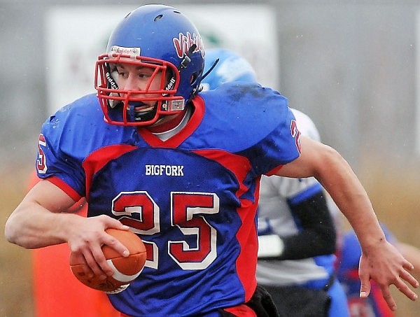 Bigfork's Cody Dopps keeps his eyes open after intercepting the ball in the third quarter.