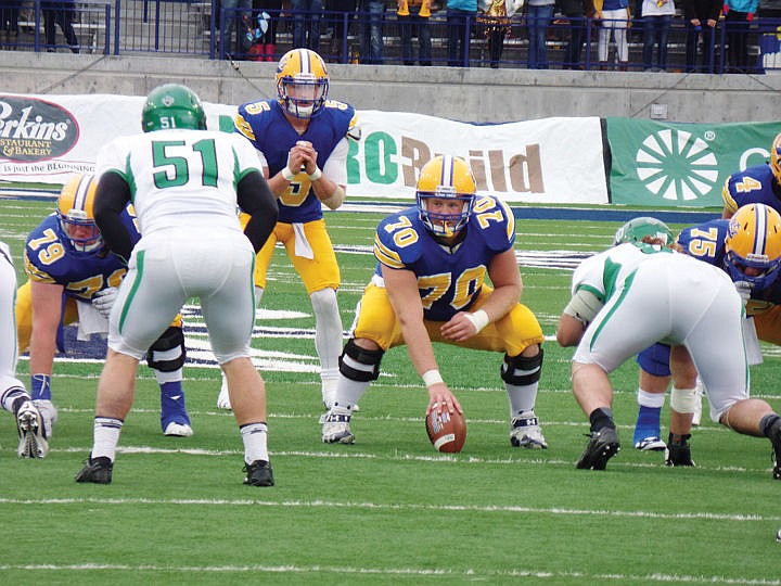 &lt;p&gt;Joel Horn, 70, waits to snap the ball during Montana State's 29-18 homecoming victory over North Dakota on Sept. 27, 2014. A graduate of Glacier High School, Horn is in his first season as the Bobcats' starting center. (Photo courtesy of Brant Horn)&lt;/p&gt;