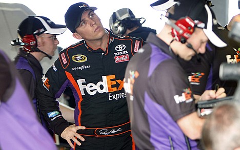 &lt;p&gt;Denny Hamlin studies a computer analysis of his car's performance during practice for today's NASCAR Sprint Cup Ford 400 at Homestead, Fla. Hamlin holds a 15-point lead over Jimmie Johnson and 46-point lead over Kevin Harvick in the Chase for the Sprint Cup championship, which will be awarded at the finish of today's season-ending race.&lt;/p&gt;