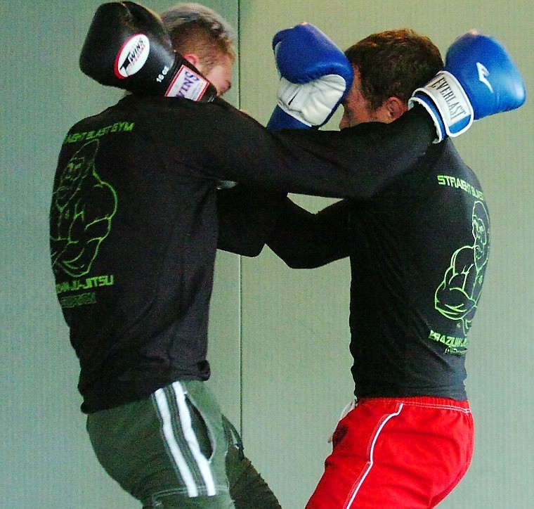 Gus Notle (left) and Will Barnhart exchange punches during a practice for Friday&#146;s event.