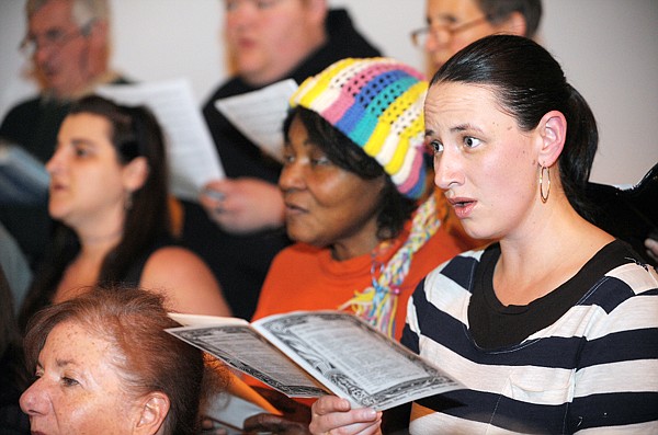 &lt;p&gt;From right, Liz Jones, Margaret Baylinson, and Jessica Trefz
sing Bless the Lord, O My Soul from the Russian Liturgy by Mikail
Ippolitov-Ivanov at rehearsal on Wednesday night at the Gateway
West Mall in Kalispell. &quot;We're thinking globally and acting
locally,&quot; said choir member Wendy Marshall. &quot;We care about the
Flathead Valley and teh whole world and we want to do something for
hungry people, especially at Thanksgiving time.&quot;&lt;/p&gt;