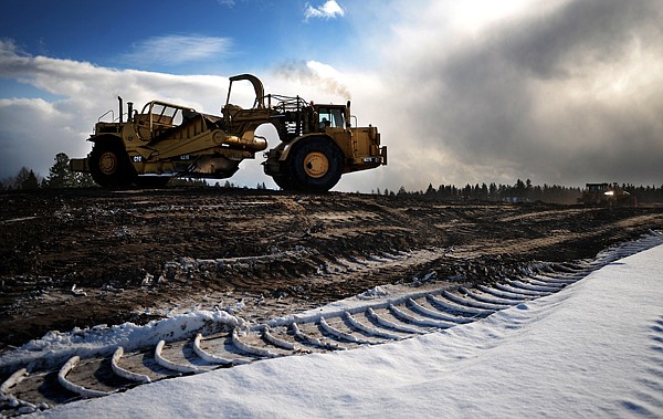 &lt;p&gt;A Caterpillar 627E Motor Scrapper is silhouetted against a
stormy sky on Thursday morning at the site of the Hutton Ranch
Connector or Reserve Drive South project on Thursday morning in
Kalispell.&lt;/p&gt;