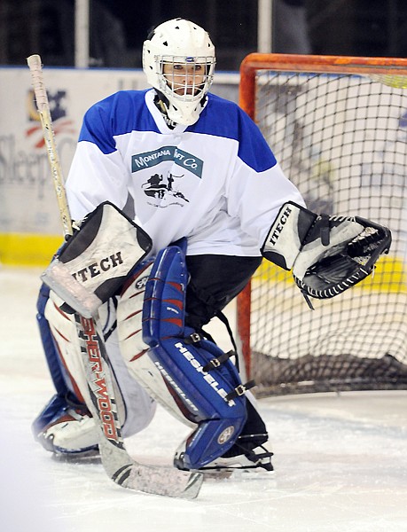 Mary-Graham Rasco warms up with her team before the start of their game on Tuesday night at the Stumptown Ice Den.