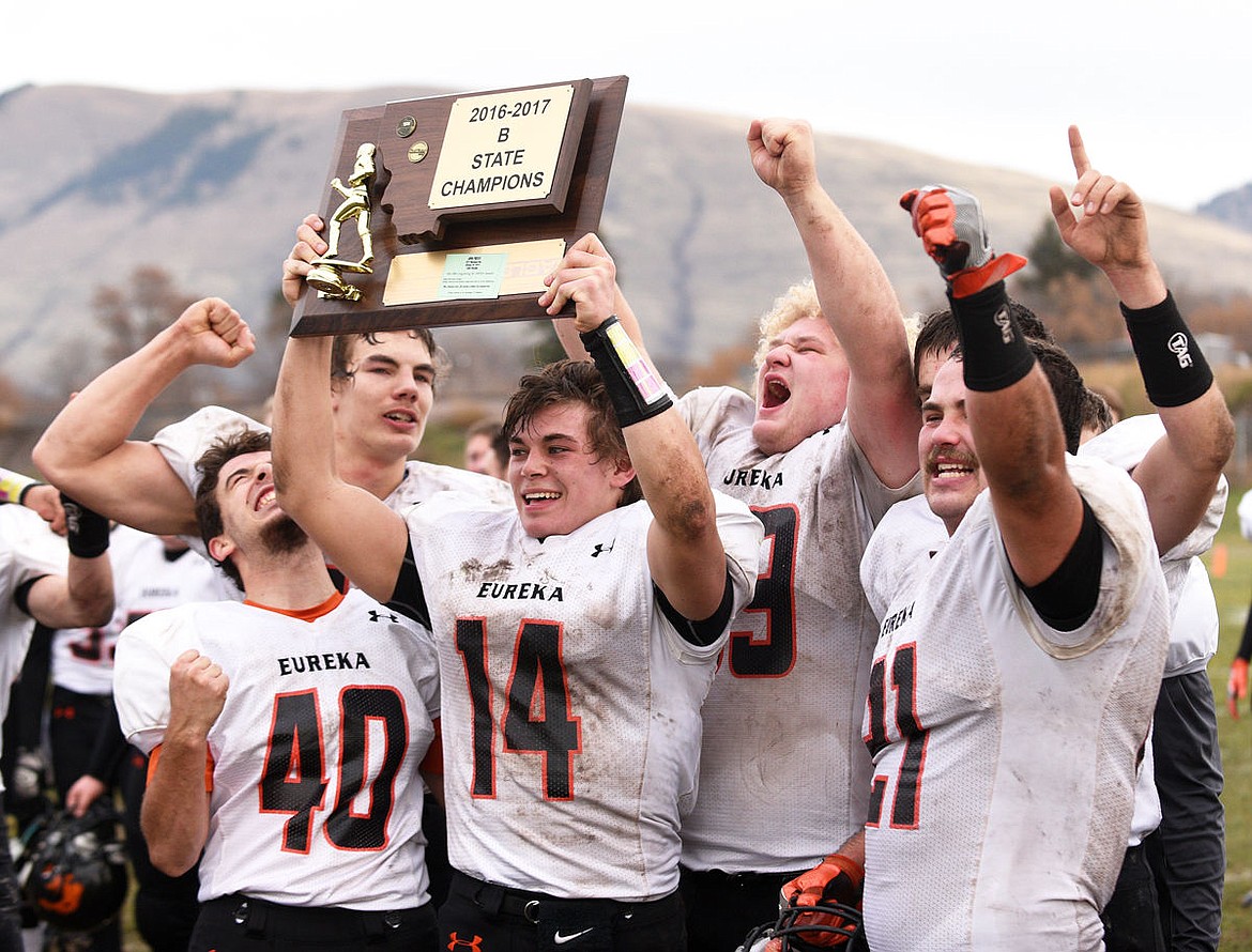 &lt;p&gt;The Eureka Lions hold up the plaque for their first state title after defeating Missoula Loyola 31-28 on a Hail Mary as time expired in the Class B Championship at Loyola on Saturday. (Aaric Bryan/Daily Inter Lake)&lt;/p&gt;