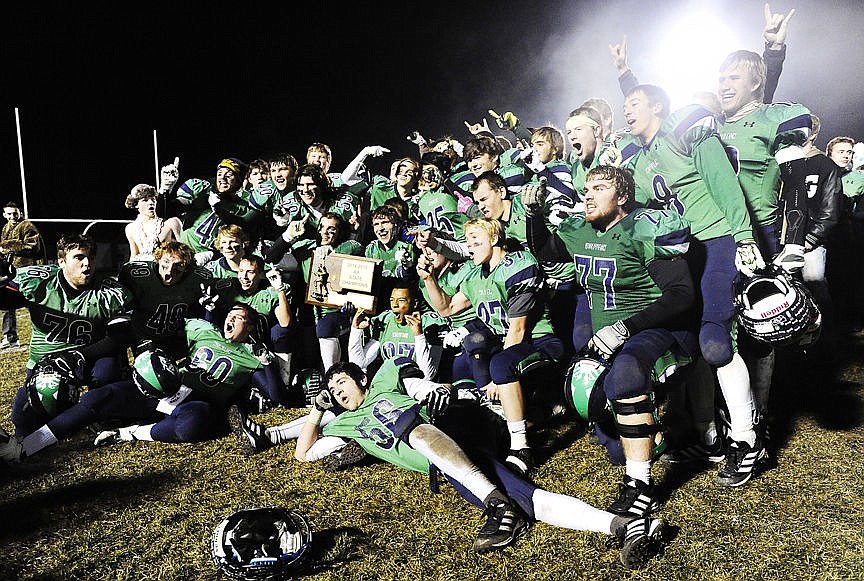 &lt;p&gt;The 2014 AA State Champions pose with the trophy. (Aaric Bryan/Daily Inter Lake)&lt;/p&gt;