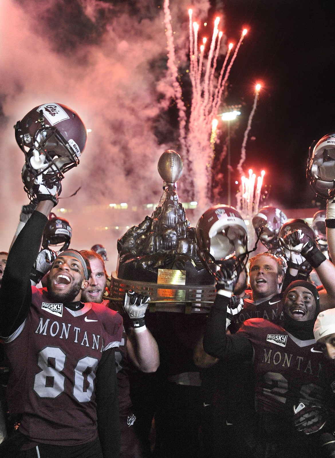 <p>Fireworks go off as the Montana Grizzlies hoist the Great Divide Trophy after defeating the Bobcats 34-7 at Washington-Grizzly Stadium in Missoula Saturday. (Aaric Bryan/Daily Inter Lake)</p>