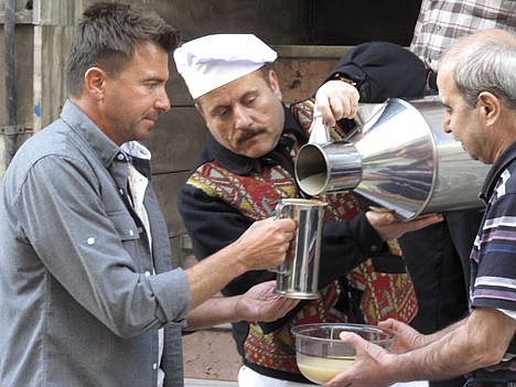 &lt;p&gt;Jack Maxwell, left, helps deliver the popular fermented beverage boza in Istanbul, Turkey, April 19.&lt;/p&gt;