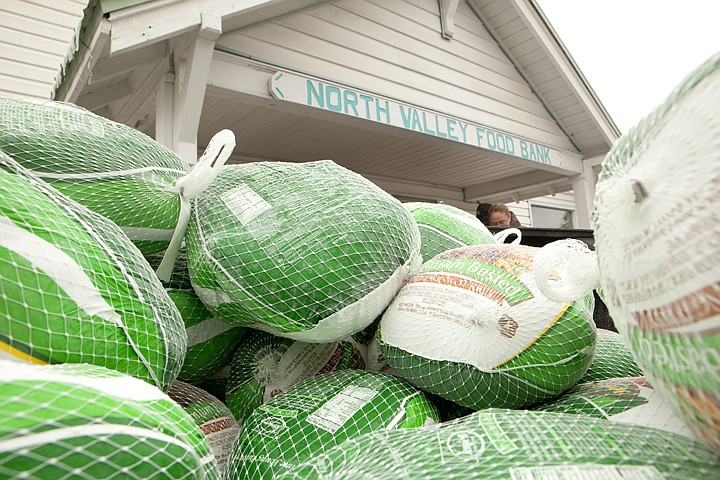 &lt;p&gt;Frozen turkeys sit in the bed of a pickup truck waiting to be
given away Tuesday afternoon at the North Valley Food Bank in
Whitefish.&lt;/p&gt;