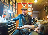 Tattoo artist carves niche in C-Falls