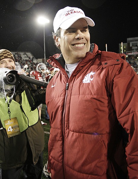 &lt;p&gt;Embattled Washington State head coach Paul Wulff smiles after his team beat Arizona State 37-27 in an NCAA college football game Saturday, Nov. 12, 2011, in Pullman, Wash. (AP Photo/Dean Hare)&lt;/p&gt;