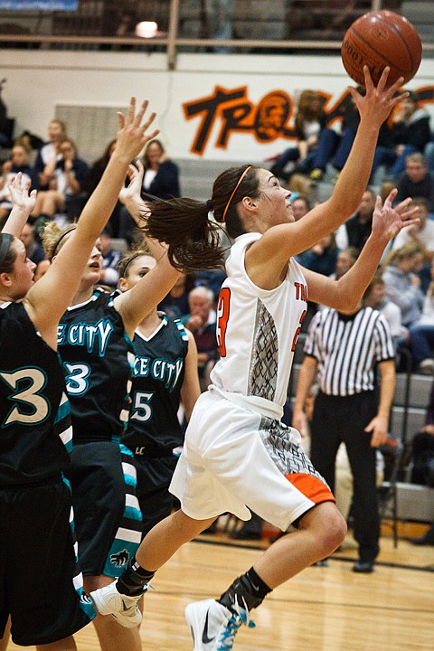<p>SHAWN GUST/Press Post Falls High School's Brooke Litalien drives passed Lake City defenders for a score in the first half Tuesday on her home court.</p>