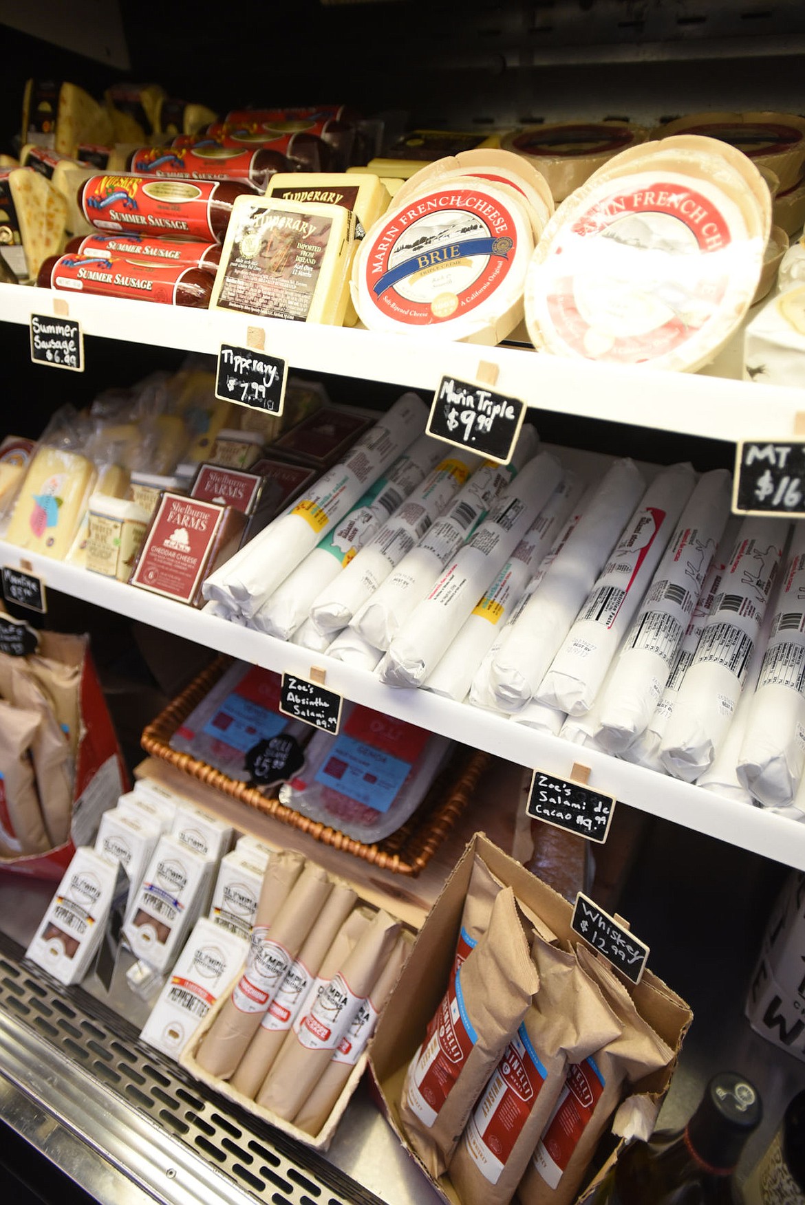 <p>Brix Bottle Shop carries non-bottled options including cheeses, condiments and dessert options. (Brenda Ahearn/Daily Inter Lake)</p>