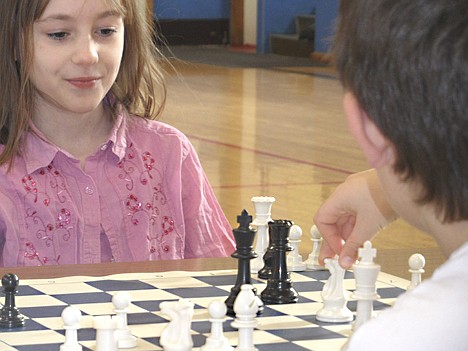 &lt;p&gt;Tabby Twitchell, Sorensen third-grader, competes against Shelby Miles, Hayden Meadows fifth-grader, at Sorensen Magnet School's chess tournament &quot;A Day with Knoghts 2010&quot; held Nov. 20.&lt;/p&gt;