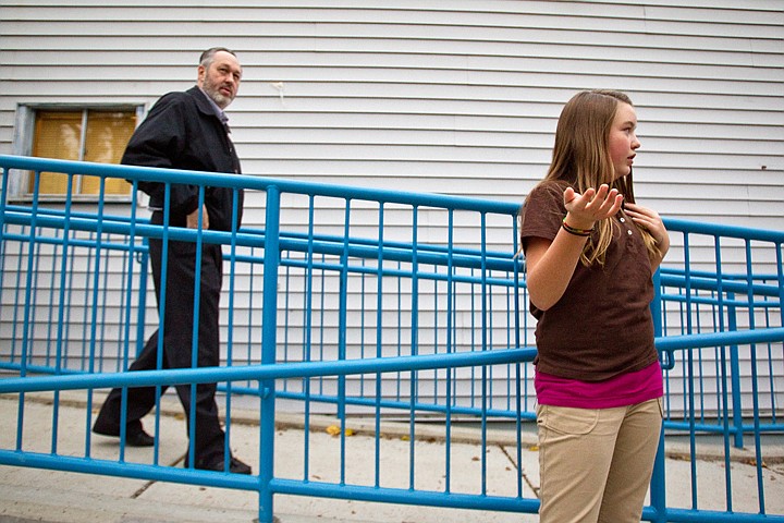 &lt;p&gt;SHAWN GUST/Press Kacey Bates, a sixth-grader at Sorenson Magnet School, talks about a new ramp that was installed as part of a $450,000 improvement project funded by the Lake City Development Corporation to help meet fire code and Americans with Disabilities Act requirements. Coeur d'Alene City Councilman All Hassell, left, was among a small group of LCDC and school district members who participated in a student-lead tour of the school Wednesday.&lt;/p&gt;