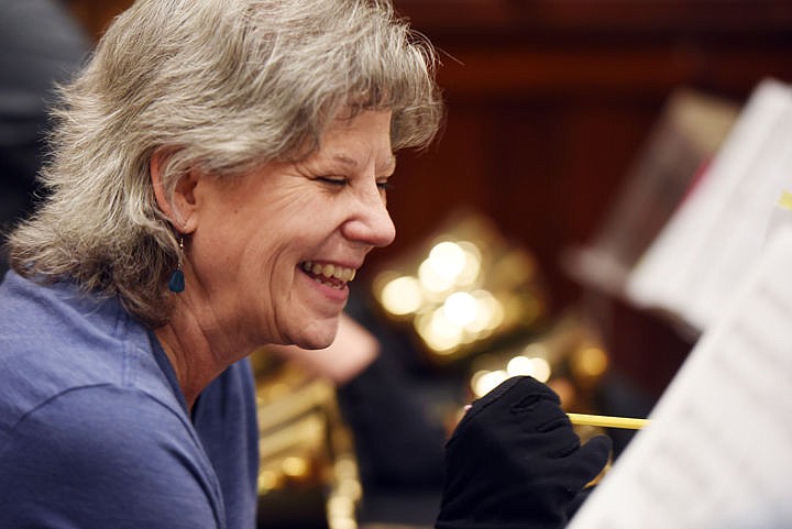 &lt;p&gt;Michelle McDowell smiles over a joke from a friend as she makes personal notes in her music as she and members of the Alpine Ringers handbell choir practice on Monday, Nov. 14, at the First Presbyterian Church in Whitefish. (Brenda Ahearn/Daily Inter Lake)&lt;/p&gt;