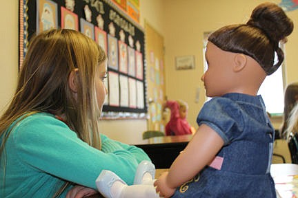 &lt;p&gt;Keri gets comfort from her doll.&lt;/p&gt;