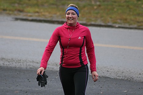 &lt;p&gt;Amy &quot;Snail&quot; Schaeffer, a displaced Missourian, triumphantly completes the Turkey Trot on Thursday. Many families and friends descent on the Silver Valley during the Thanksgiving holiday to participate in the fun run.&lt;/p&gt;