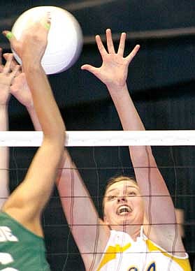 Jenna Cederberg for The Western News Jackie Mee stretches out on a block attempt.