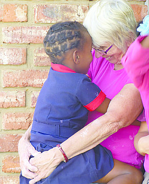 &lt;p&gt;Lesley Dubay of Polson, holds a child while spending some quality time at the daycare.&lt;/p&gt;