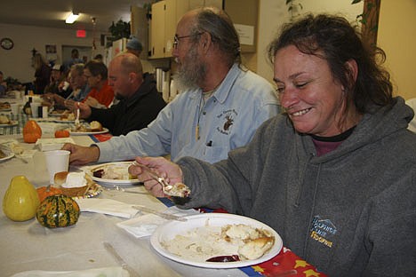 &lt;p&gt;Monique Jenkins digs into the free Thanksgiving meal provided on Thursday at Fresh Start. Jenkins, currently living in an encampment, was happy to share a holiday meal with her Fresh Start friends.&lt;/p&gt;