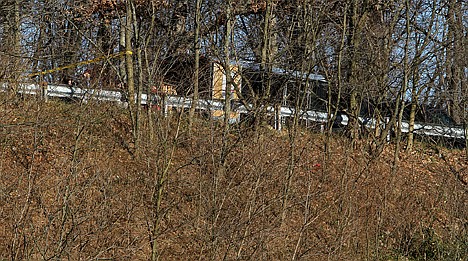 &lt;p&gt;Law enforcement officials work at a crime scene on Harlem Road in Akron, Ohio, where a body was found on Friday.&lt;/p&gt;