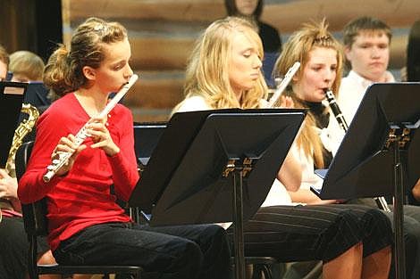 Nick Ianniello/Mineral Independent Cary Chamberlain (left), Jessica Yarnall and Tamera Rennick perfrom Nov. 17 at the Superior High School band and choir dinner concert.